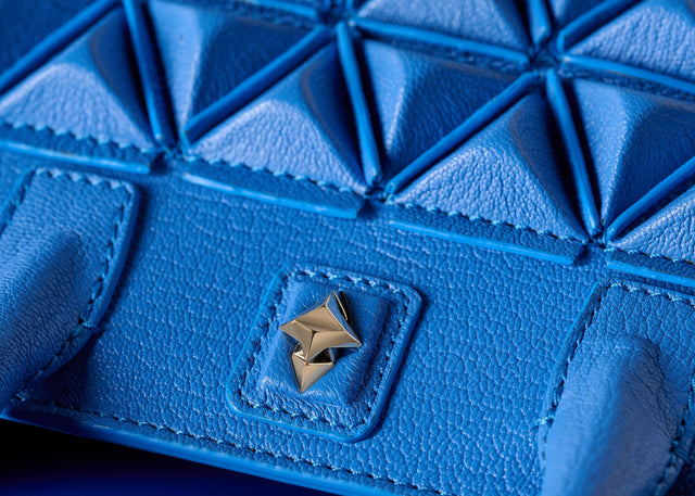 Blue Shield Handbag Detail by Sofia Al Asfoor