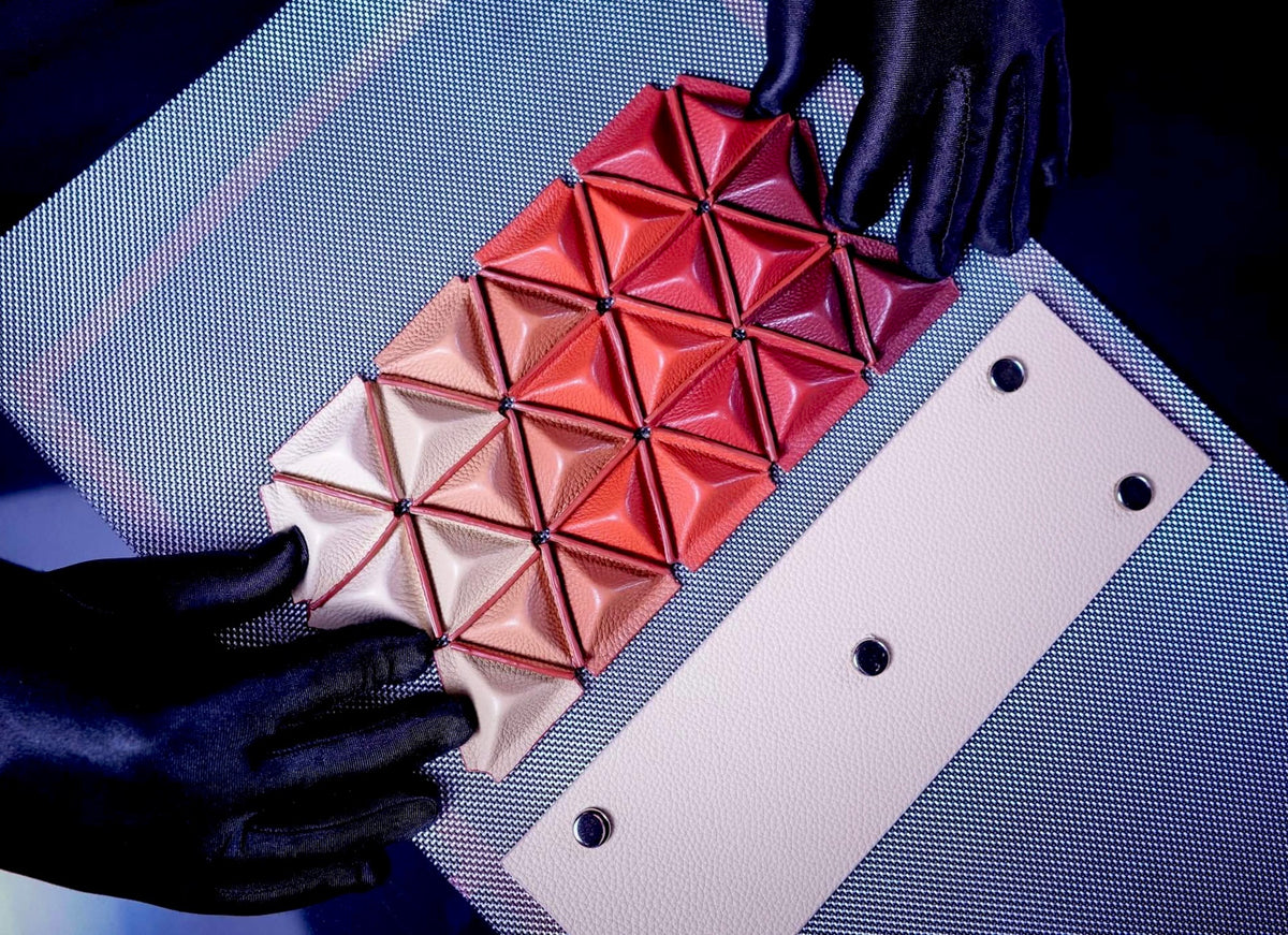 Pyramid handbag motif craft by Sofia Al Asfoor